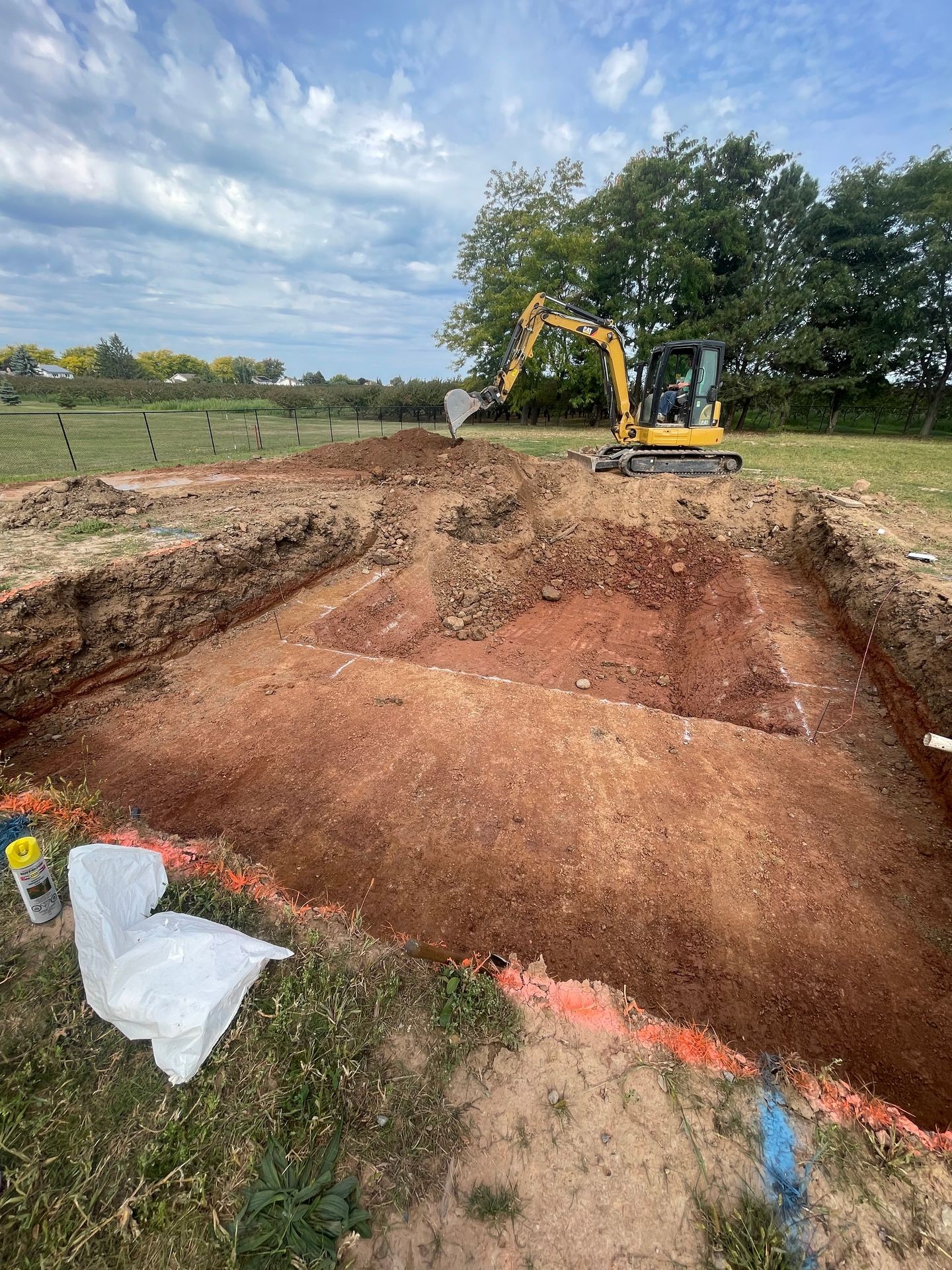 Mini-Excavator digging for pool build