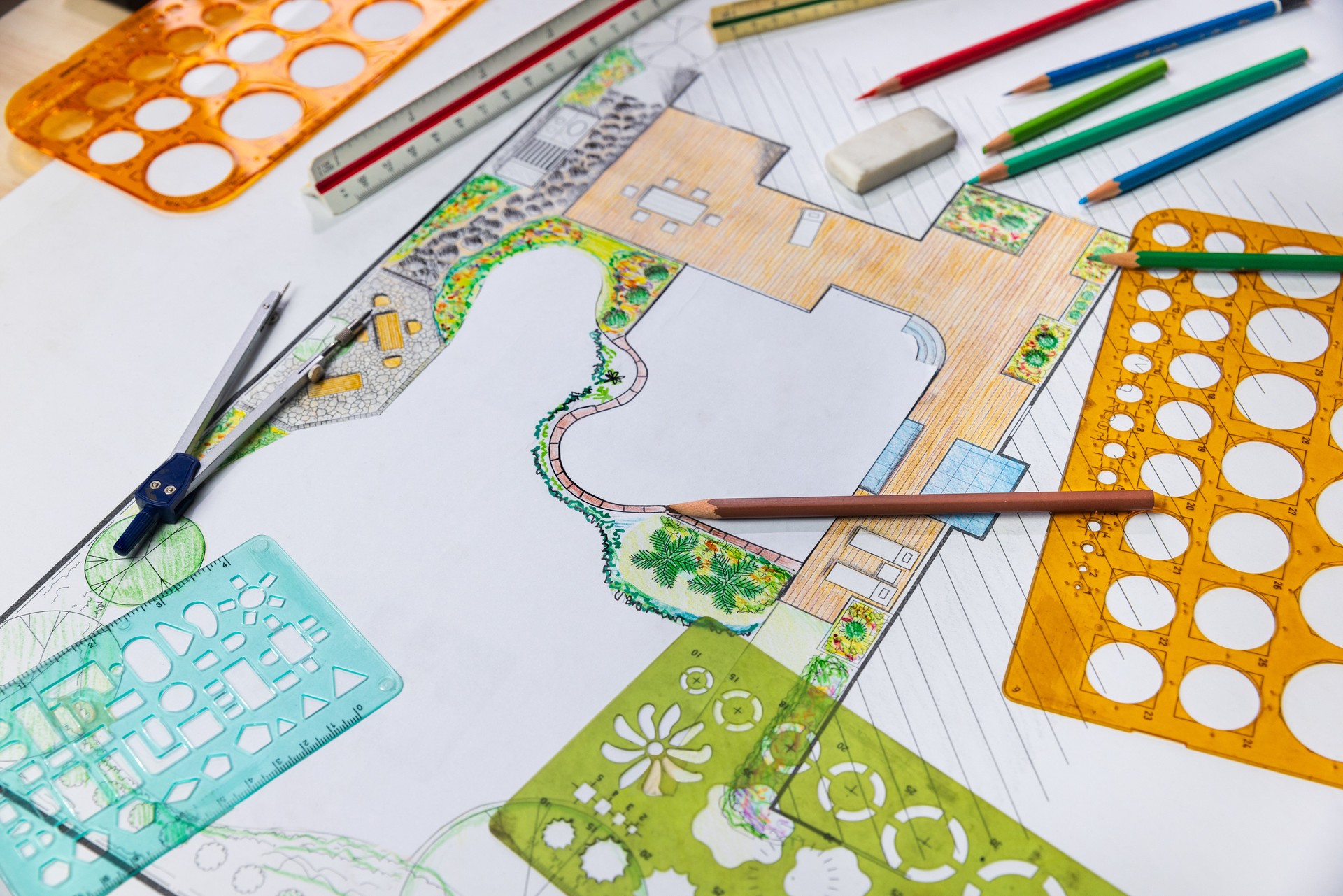 Landscape architect student learning garden plan design by hand drawing.